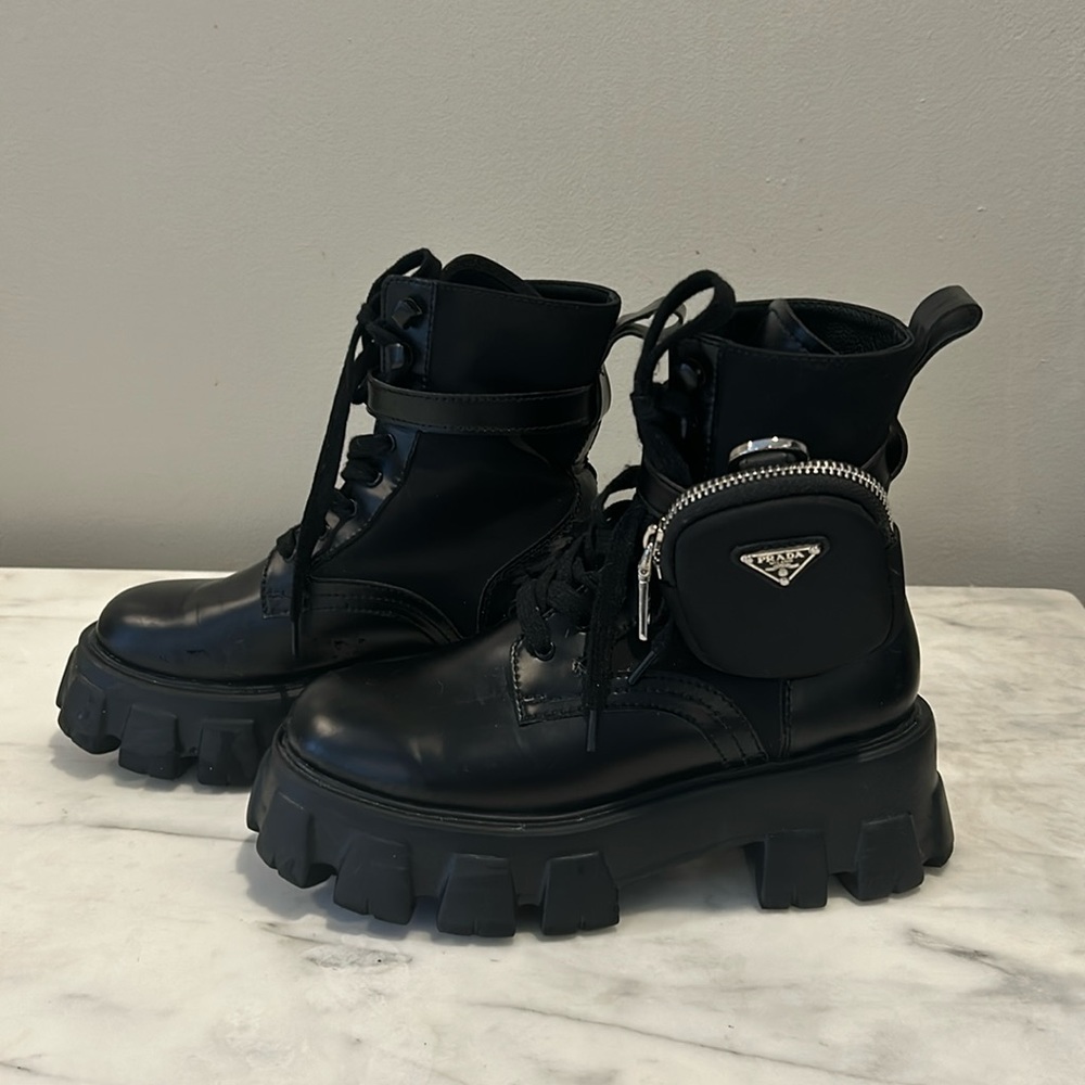 Black Prada combat boots with removable pouch